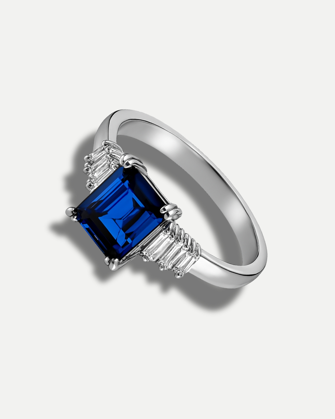 Emerald Cut Halo Blue Ring