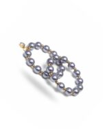 Light purple circular hoop earrings with a sleek modern design.