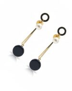 Black and gold pearl drop earrings with elegant design.