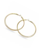 Large tricircular gold hoop earrings with modern bold design.