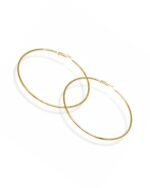 Trendy circular gold hoop earrings with a sleek minimal design.